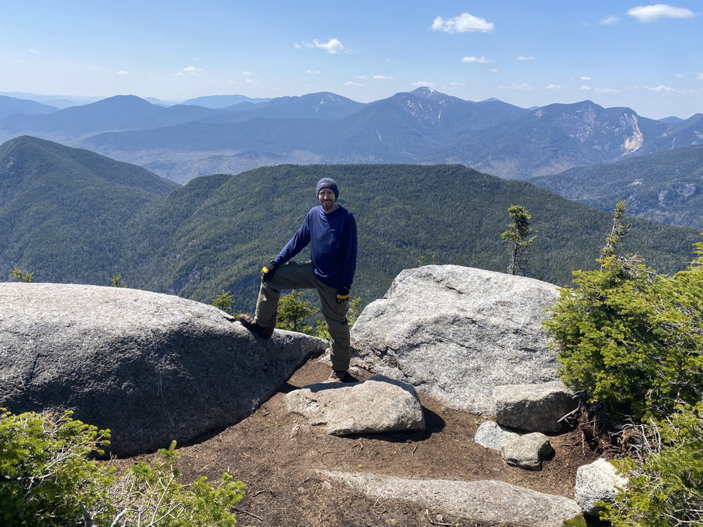 Niels standing on the official summit of Nippletop, Adirondacks